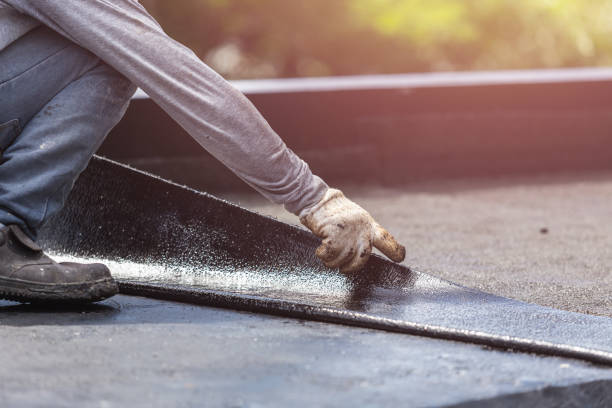 Professional Basement Waterproofing technician working in Milan, IN